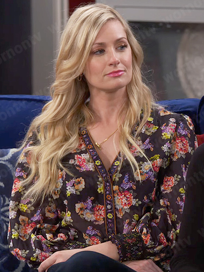 Gemma's black floral v-neck top on The Neighborhood