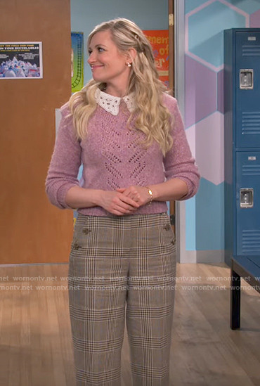 Gemma's lilac pointelle sweater and plaid pants on The Neighborhood