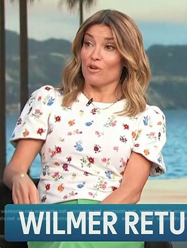 Kit's white floral print short sleeve top on Access Hollywood