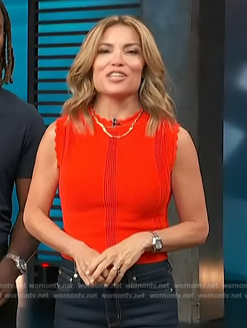 Kit's red scalloped trim top on Access Hollywood