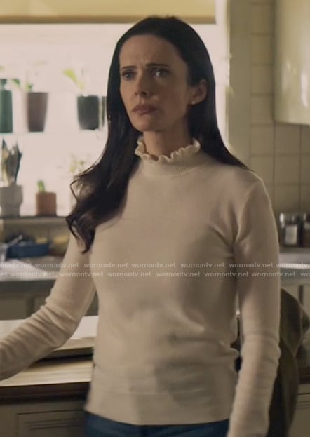 Lois's white ruffled neck sweater on Superman and Lois