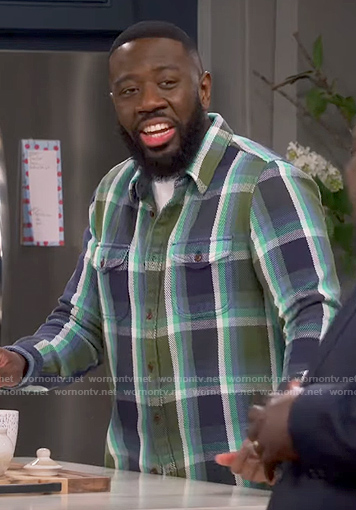 Malcolm's green and navy plaid shirt on The Neighborhood