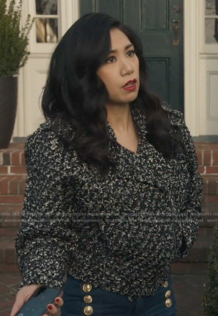 Mel's black and white boucle jacket and gold button jeans on The Equalizer