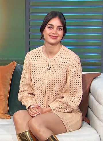 Melissa Barrera's beige eyelet leather jacket and skirt on Access Hollywood