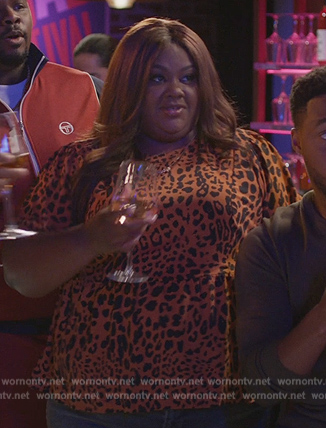 Nicky's leopard print peplum top on Grand Crew