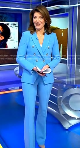 Norah's blue double breasted blazer and pants on CBS Evening News