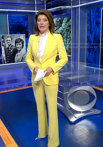 Norah's yellow pant suit on CBS Evening News