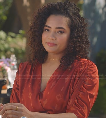 Natalia's orange printed wrap dress on 9-1-1
