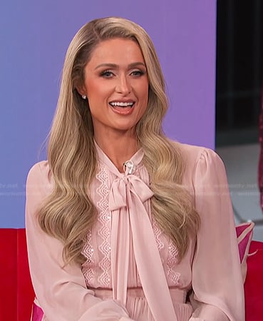 Paris Hilton's pink tie neck dress on E! News