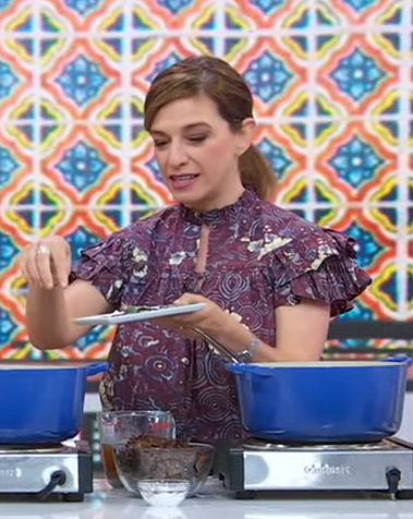 Pati Jinich's purple printed ruffle top on Good Morning America