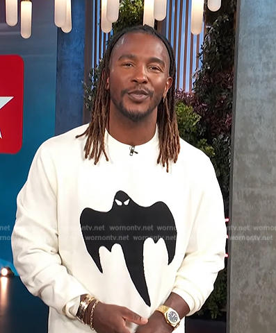Scott's white ghost print sweater on Access Hollywood