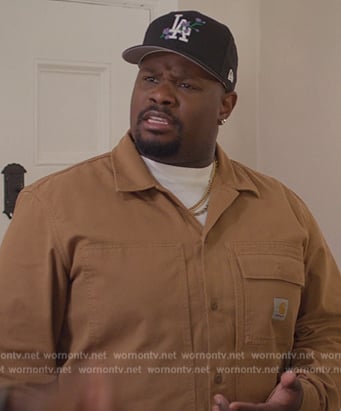 Sherm's khaki button down shirt on Grand Crew