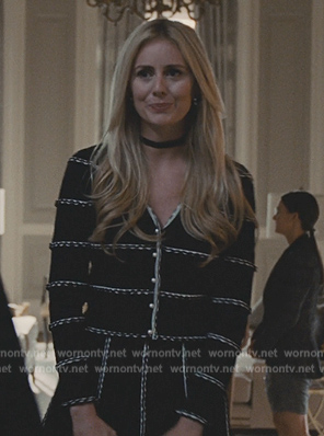 Willa's black stripe knit cardigan and skirt on Succession