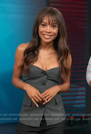 Zuri's grey button down vest on Access Hollywood