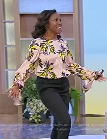 Deborah Roberts' pink floral blouse on Tamron Hall