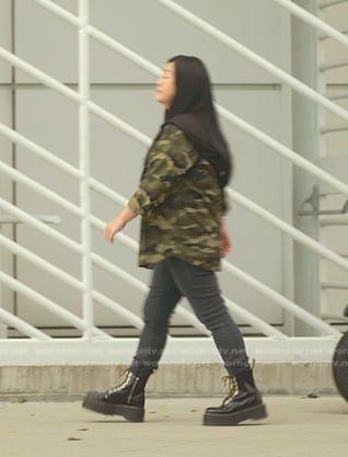 Alice's black combat boots on Good Trouble