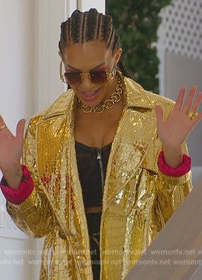 Amanza's gold metallic crocodile skin coat on Selling Sunset