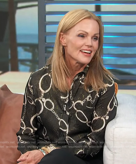 Belinda Carlisle's black metallic chain link blouse on Access Hollywood