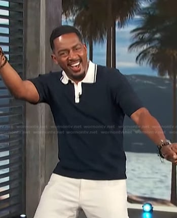 Bill Bellamy's navy contrast collar polo shirt on Access Hollywood