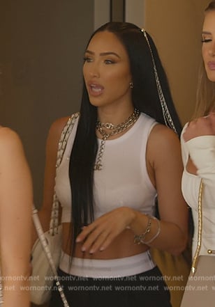 Bre's white crop top and pants on Selling Sunset