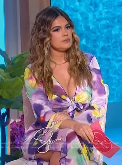 Kathy Buccio's floral print top and skirt on Sherri