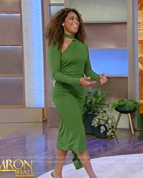Gina Torres' green asymmetric slash neck dress on Tamron Hall Show