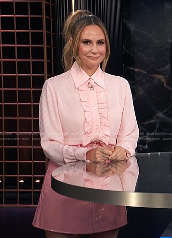 Keltie's pink ruffle front shirt and mini skirt on E! News
