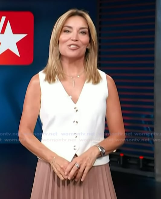 Kit's white vest on Access Hollywood
