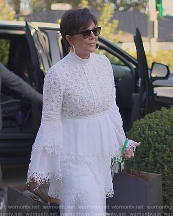Kris's white lace bell sleeve dress on The Kardashians