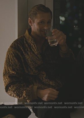 Lukas's gold velvet quilted bomber jacket on Succession