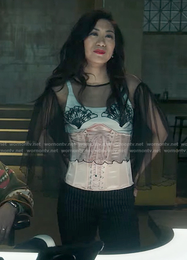 Mel's pink corset on The Equalizer