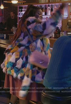Nicky's faux fur coat on Grand Crew