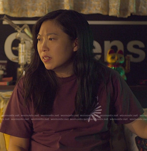 Nora's purple daisy t-shirt on Awkwafina is Nora From Queens