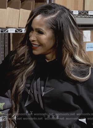 Sheree's black star logo hoodie on The Real Housewives of Atlanta
