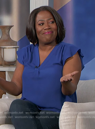 Sheryl's blue flutter sleeve top on The Talk