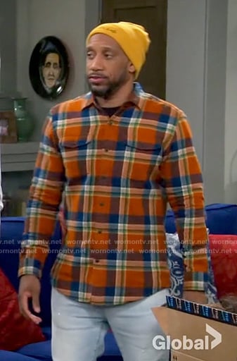 Trey's orange plaid shirt on The Neighborhood