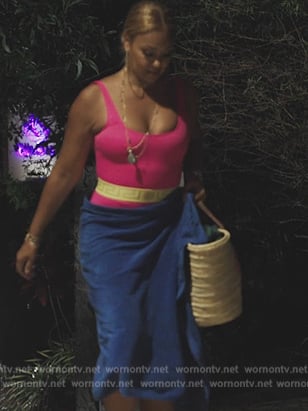 Gizelle's pink medusa logo swimsuit on The Real Housewives Ultimate Girls Trip