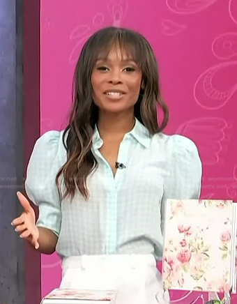 Zuri's blue houndstooth puff sleeve top on Access Hollywood