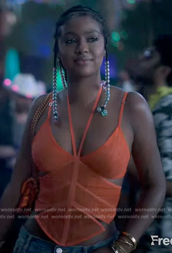 Annika's orange strappy top on Grown-ish