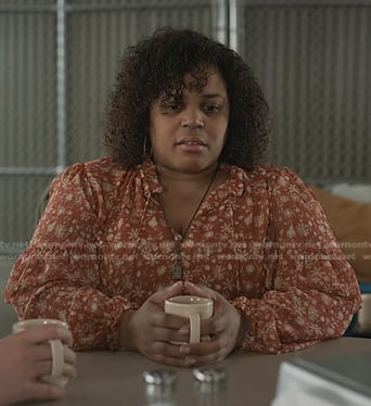 Astrid's orange floral tie neck blouse on Manifest