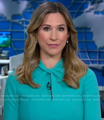 Caitlin Huey-Burns's teal green twist-neck dress on CBS Mornings