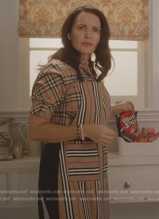 Charlotte's plaid short sleeve blouse on And Just Like That