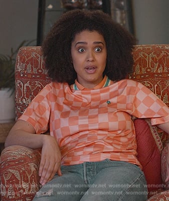 Fabiola's orange checkerboard polo on Never Have I Ever