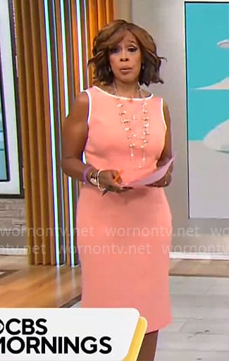 Gayle King's coral sheath dress with white trims on CBS Mornings
