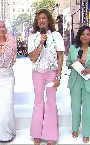 Hoda's white floral embroidered top and pink flare jeans on Today