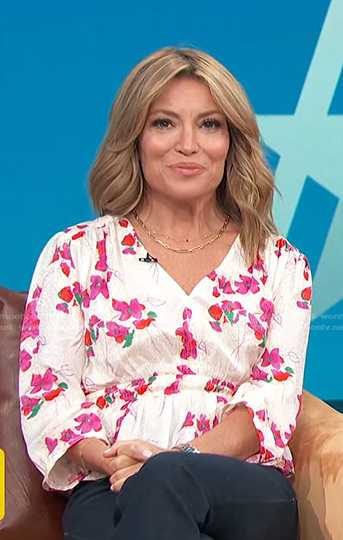 Kit's white floral v-neck top on Access Hollywood