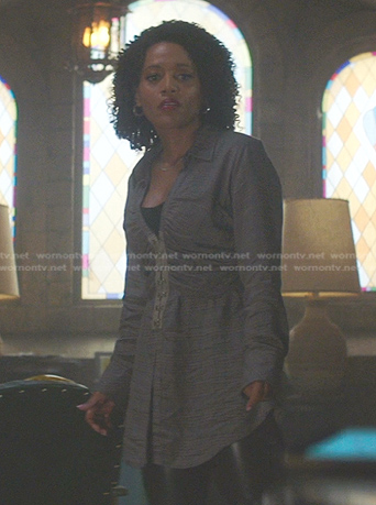 Laci's grey plaid top on Nancy Drew