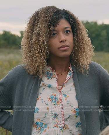 Polly's white floral blouse and grey cardigan on Manifest