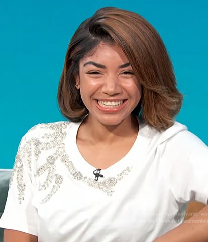 Stakiah Washington's white beaded tee on Access Hollywood