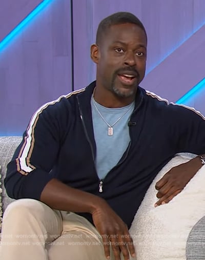Sterling Brown's navy sleeve stripe jacket on The Kelly Clarkson Show